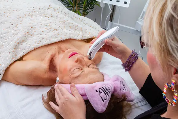 Receiving a facial treatment at Nova Beauty Center